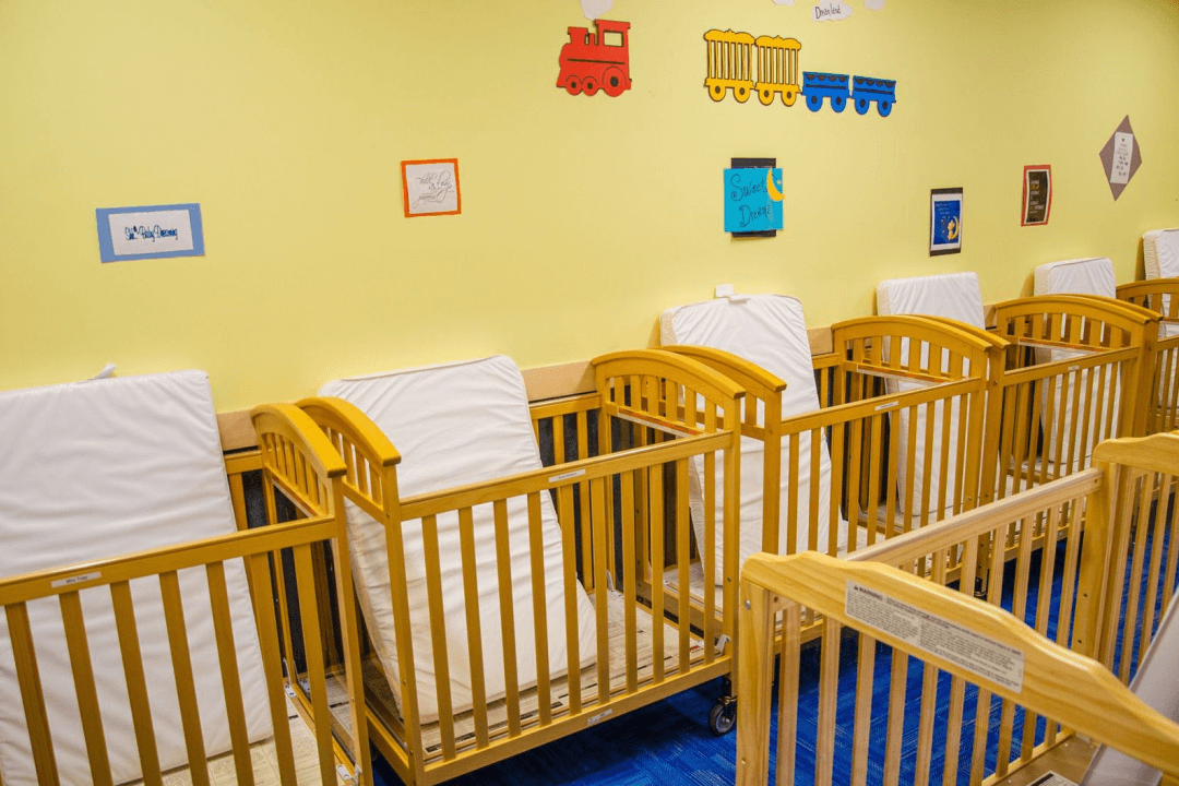 The Early Advantage crib room includes a fan, large windows, and regular checks on sleeping infants. 