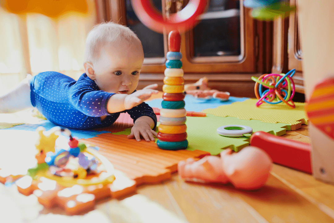 Encouraging your baby to reach can help your baby make the most of tummy time as they get older. 