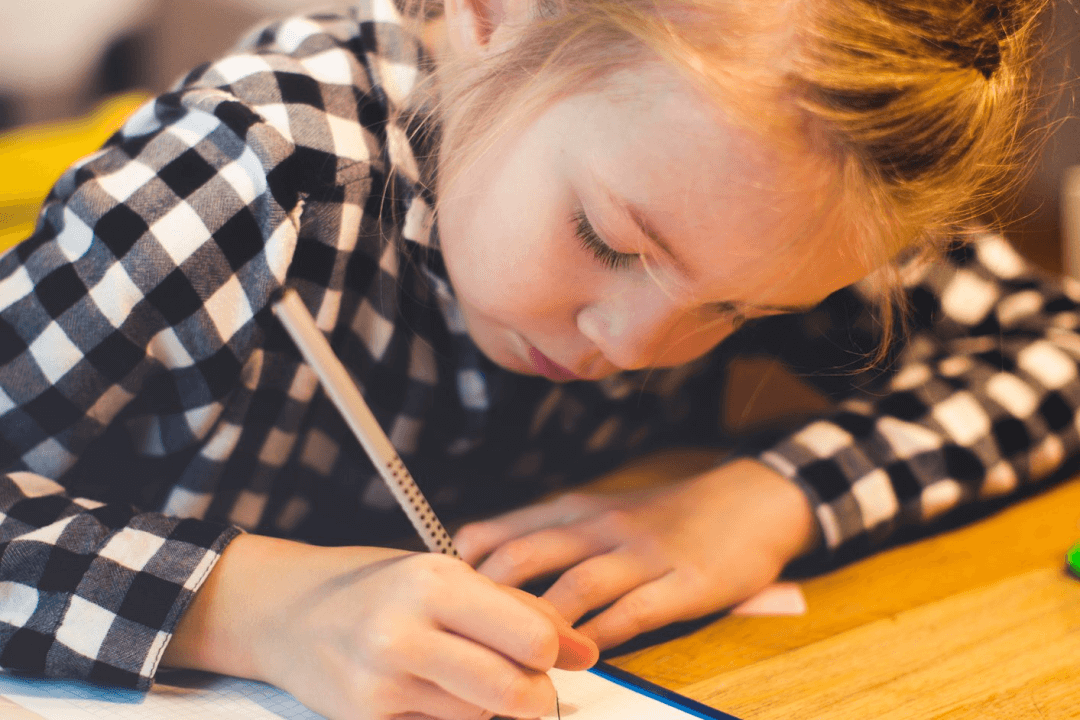 Child working calmly at desk