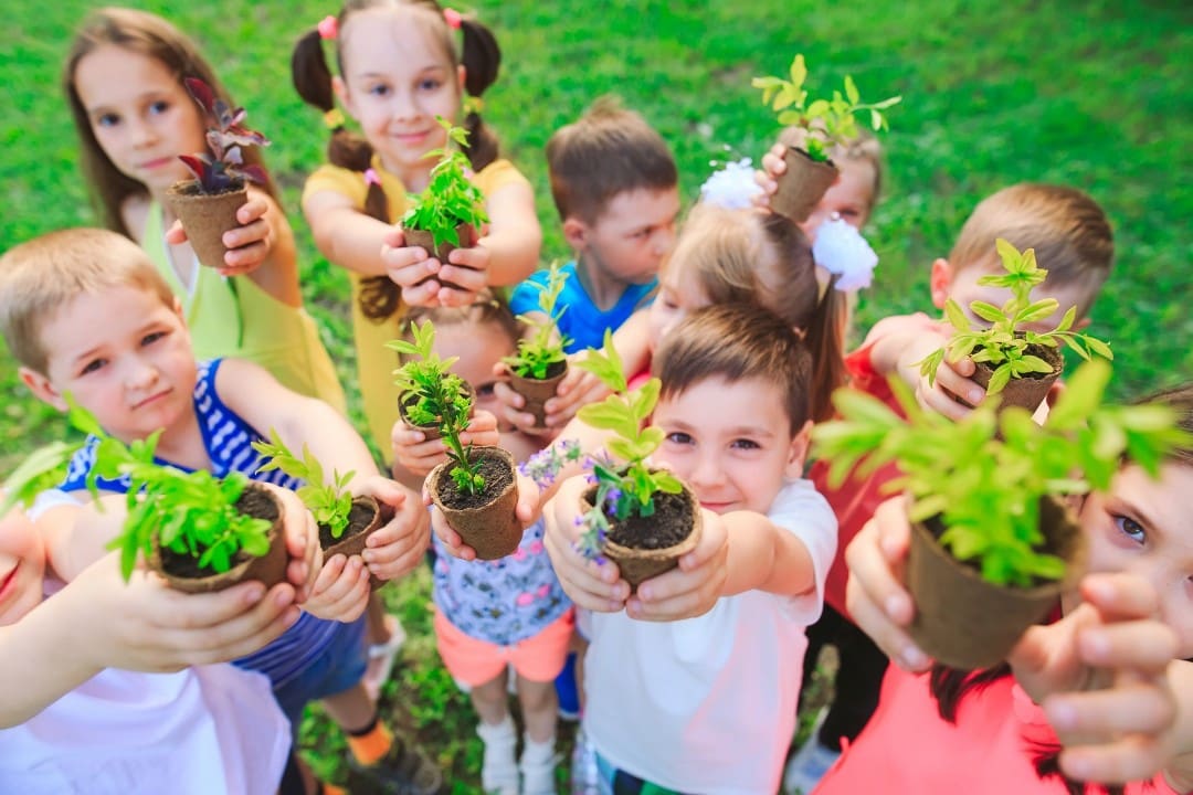 Kids in childcare getting benefits of gardening
