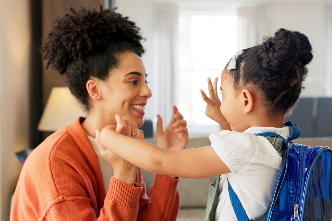 Parent getting child ready for kindergarten